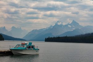 Maligne Lake Boats with mountains behind